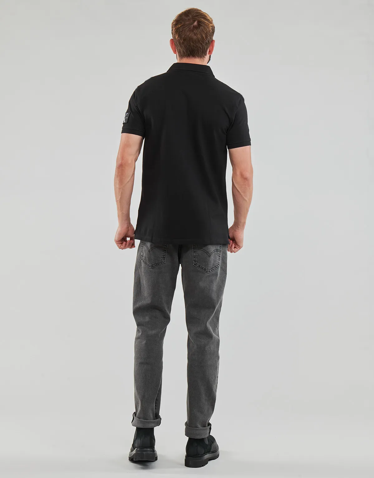 Polo Shirt with Embroidered Badge